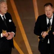 Charlie Mackesy, left, and Matthew Freud accept the award for best animated short for The Boy, the Mole, the Fox and the Horse at the Oscars on Sunday, March 12, 2023, at the Dolby Theatre in Los Angeles
