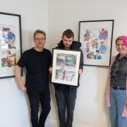 Neil Cole with artist Nathan Russel and Debbie Brown
