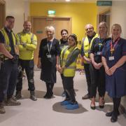 (L-R) Construction staff with Marion Dickson, executive director for nursing, midwifery and AHPs, Jane Ferguson, modern matron and Helen Mason, senior manager of public health