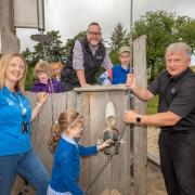 (L-R) Sarah Burn, head of engagement at Northumberland National Park with Neil Beards, strategic planning manager at Tarmac and Steve Carter senior operations manager at Tarmac, with children from Newbrough Primary School