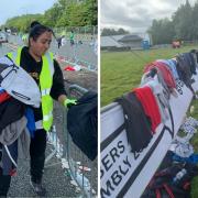 A team from the Great North Air Ambulance Service (GNAAS) is collecting discarded clothing at the start of the Great North Run