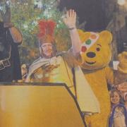 BBC weatherman Paul Mooney and Pudsey hitch a ride on a Roman chariot as part of proceedings for the BBC Children in Need event in Hexham in 2013