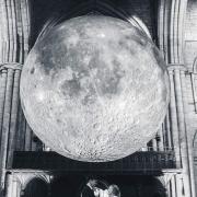 Connor and Rebecca under the moon at Hexham Abbey