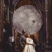 Lauren and Jordan Whitehouse under the moon at Hexham Abbey