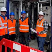 Teams from Northumbrian Water and Organics in front of the ammonia stripper