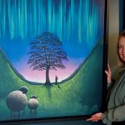 Lucy Pittaway with her artwork