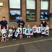 (L) Becky Gibson, Chollerton Pre-school manager, with pupils holding the outstanding Ofsted rating