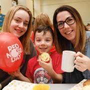Amy Riley, Theo Thompson and mum Philippa Thompson at the Shaftoe Trust Wise Academy Red Nose Day in 2019coffee morning.