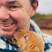 Guy Opperman MP with his Fox Red Labrador, Zola