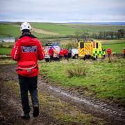 Rescue crews wish walker a 'swift recovery' after collapsing near Hadrian's Wall during family outing.